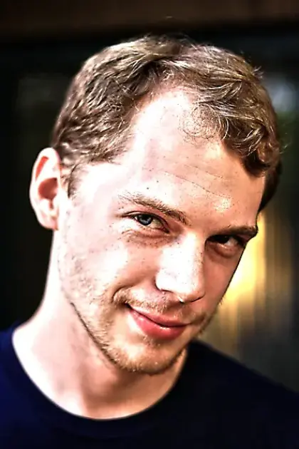 high contrast photo of man smiling