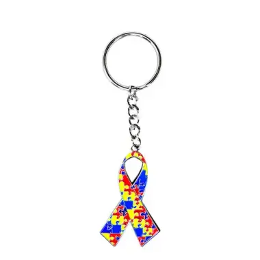 A ribbon keychain decorated with puzzle pieces