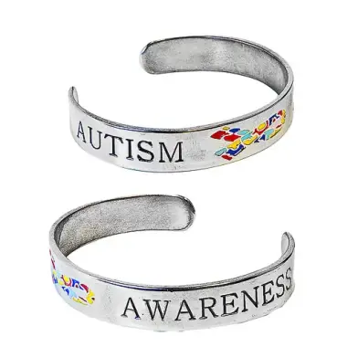 metal bracelet with the words Autism Awareness