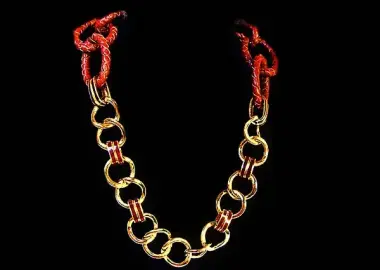 necklace made from both leather and golden rings