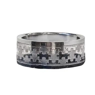 ring accentuated with puzzle pieces