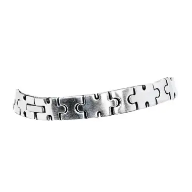thick metal bracelet made of puzzle pieces